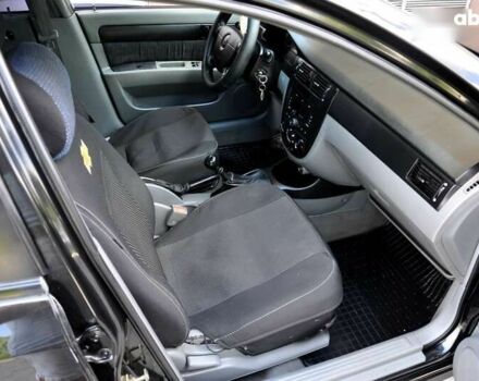 Черный Шевроле Лачетти, объемом двигателя 1.6 л и пробегом 245 тыс. км за 2999 $, фото 14 на Automoto.ua