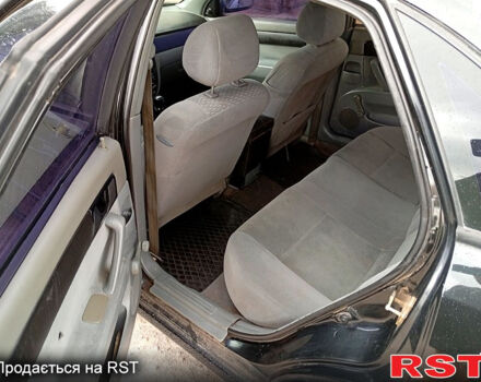 Черный Шевроле Лачетти, объемом двигателя 1.6 л и пробегом 350 тыс. км за 3000 $, фото 9 на Automoto.ua