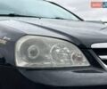 Черный Шевроле Лачетти, объемом двигателя 1.6 л и пробегом 247 тыс. км за 3890 $, фото 12 на Automoto.ua