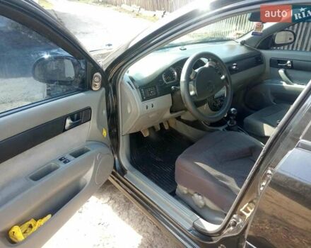 Черный Шевроле Лачетти, объемом двигателя 1.8 л и пробегом 145 тыс. км за 4100 $, фото 3 на Automoto.ua