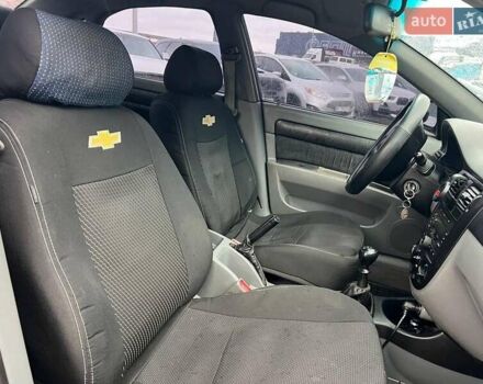 Черный Шевроле Лачетти, объемом двигателя 1.6 л и пробегом 247 тыс. км за 3890 $, фото 32 на Automoto.ua