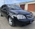 Черный Шевроле Лачетти, объемом двигателя 1.6 л и пробегом 308 тыс. км за 4300 $, фото 1 на Automoto.ua