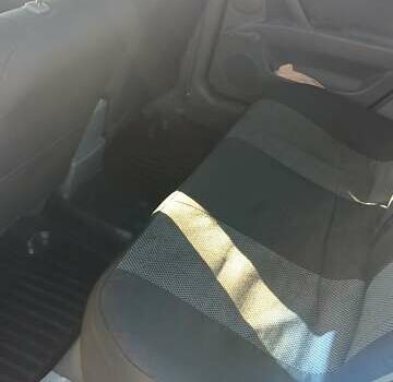 Черный Шевроле Лачетти, объемом двигателя 1.6 л и пробегом 209 тыс. км за 4500 $, фото 3 на Automoto.ua