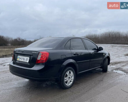 Черный Шевроле Лачетти, объемом двигателя 1.6 л и пробегом 222 тыс. км за 4400 $, фото 5 на Automoto.ua