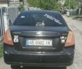 Черный Шевроле Лачетти, объемом двигателя 1.6 л и пробегом 999 тыс. км за 1575 $, фото 1 на Automoto.ua