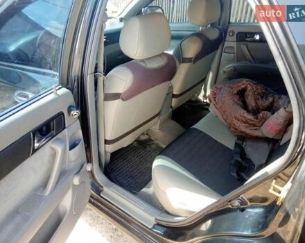 Черный Шевроле Лачетти, объемом двигателя 1.8 л и пробегом 145 тыс. км за 4100 $, фото 6 на Automoto.ua