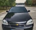 Черный Шевроле Лачетти, объемом двигателя 1.8 л и пробегом 265 тыс. км за 4600 $, фото 5 на Automoto.ua