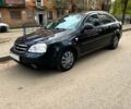 Черный Шевроле Лачетти, объемом двигателя 1.6 л и пробегом 280 тыс. км за 4000 $, фото 1 на Automoto.ua