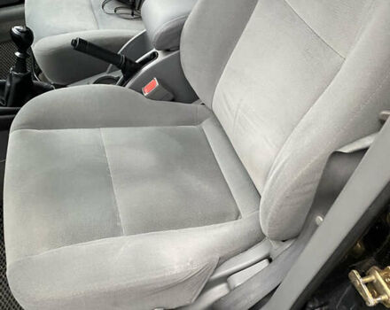 Черный Шевроле Лачетти, объемом двигателя 1.6 л и пробегом 154 тыс. км за 4800 $, фото 12 на Automoto.ua