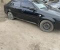 Черный Шевроле Лачетти, объемом двигателя 1.6 л и пробегом 265 тыс. км за 2400 $, фото 1 на Automoto.ua