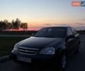Черный Шевроле Лачетти, объемом двигателя 1.6 л и пробегом 230 тыс. км за 3800 $, фото 1 на Automoto.ua
