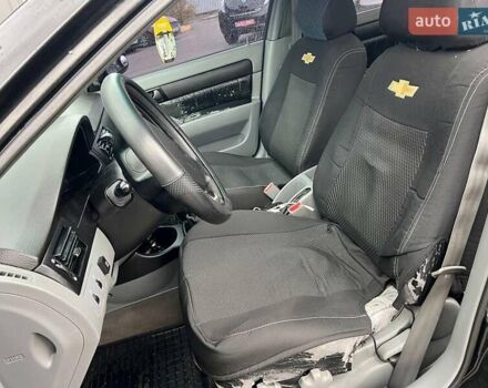Черный Шевроле Лачетти, объемом двигателя 1.6 л и пробегом 247 тыс. км за 3890 $, фото 17 на Automoto.ua