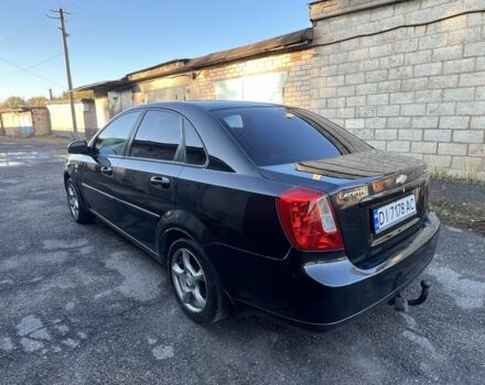 Черный Шевроле Лачетти, объемом двигателя 1.8 л и пробегом 300 тыс. км за 3950 $, фото 4 на Automoto.ua
