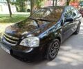 Черный Шевроле Лачетти, объемом двигателя 1.6 л и пробегом 240 тыс. км за 4300 $, фото 1 на Automoto.ua