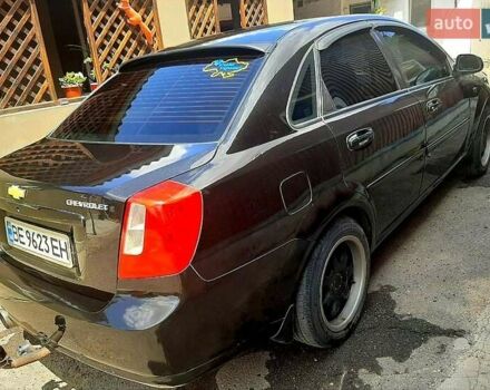 Черный Шевроле Лачетти, объемом двигателя 1.8 л и пробегом 150 тыс. км за 4800 $, фото 1 на Automoto.ua