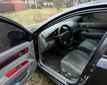 Черный Шевроле Лачетти, объемом двигателя 1.8 л и пробегом 213 тыс. км за 3750 $, фото 11 на Automoto.ua