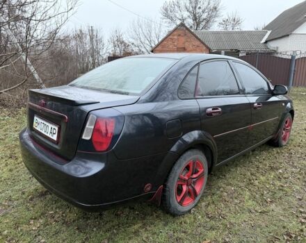 Черный Шевроле Лачетти, объемом двигателя 1.8 л и пробегом 213 тыс. км за 3750 $, фото 12 на Automoto.ua