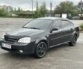 Черный Шевроле Лачетти, объемом двигателя 1.6 л и пробегом 254 тыс. км за 3600 $, фото 1 на Automoto.ua