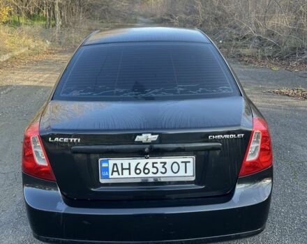 Черный Шевроле Лачетти, объемом двигателя 1.6 л и пробегом 150 тыс. км за 5300 $, фото 4 на Automoto.ua