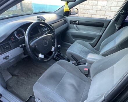 Черный Шевроле Лачетти, объемом двигателя 1.8 л и пробегом 300 тыс. км за 3950 $, фото 7 на Automoto.ua