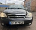 Черный Шевроле Лачетти, объемом двигателя 1.8 л и пробегом 200 тыс. км за 3200 $, фото 1 на Automoto.ua