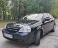 Черный Шевроле Лачетти, объемом двигателя 1.8 л и пробегом 265 тыс. км за 4800 $, фото 1 на Automoto.ua