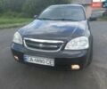 Черный Шевроле Лачетти, объемом двигателя 1.8 л и пробегом 245 тыс. км за 4200 $, фото 1 на Automoto.ua