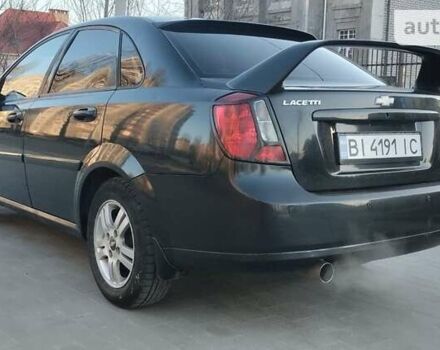 Черный Шевроле Лачетти, объемом двигателя 1.8 л и пробегом 237 тыс. км за 3850 $, фото 6 на Automoto.ua