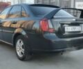 Черный Шевроле Лачетти, объемом двигателя 1.8 л и пробегом 237 тыс. км за 3850 $, фото 6 на Automoto.ua