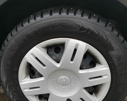 Черный Шевроле Лачетти, объемом двигателя 1.6 л и пробегом 185 тыс. км за 5300 $, фото 6 на Automoto.ua