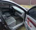Черный Шевроле Лачетти, объемом двигателя 1.8 л и пробегом 213 тыс. км за 3750 $, фото 5 на Automoto.ua
