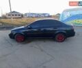 Черный Шевроле Лачетти, объемом двигателя 1.8 л и пробегом 293 тыс. км за 4200 $, фото 1 на Automoto.ua