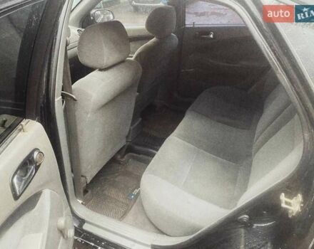 Черный Шевроле Лачетти, объемом двигателя 1.8 л и пробегом 280 тыс. км за 2750 $, фото 1 на Automoto.ua