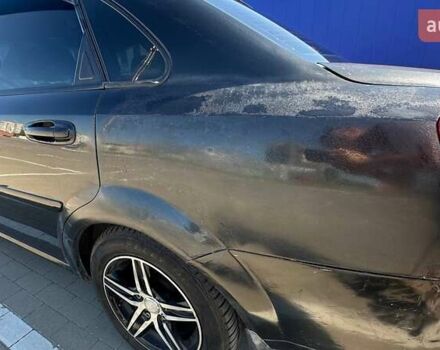 Чорний Шевроле Лачетті, об'ємом двигуна 1.8 л та пробігом 291 тис. км за 3700 $, фото 16 на Automoto.ua