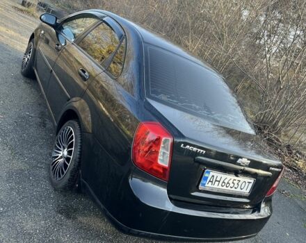 Черный Шевроле Лачетти, объемом двигателя 1.6 л и пробегом 150 тыс. км за 5300 $, фото 5 на Automoto.ua