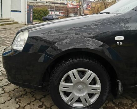 Черный Шевроле Лачетти, объемом двигателя 1.6 л и пробегом 185 тыс. км за 5300 $, фото 20 на Automoto.ua