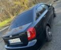 Черный Шевроле Лачетти, объемом двигателя 1.6 л и пробегом 150 тыс. км за 5300 $, фото 3 на Automoto.ua