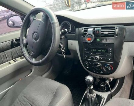 Черный Шевроле Лачетти, объемом двигателя 1.6 л и пробегом 247 тыс. км за 3890 $, фото 33 на Automoto.ua