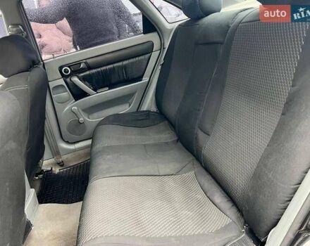 Черный Шевроле Лачетти, объемом двигателя 1.6 л и пробегом 247 тыс. км за 3890 $, фото 30 на Automoto.ua