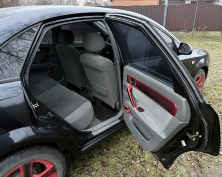 Черный Шевроле Лачетти, объемом двигателя 1.8 л и пробегом 213 тыс. км за 3750 $, фото 6 на Automoto.ua