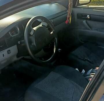 Черный Шевроле Лачетти, объемом двигателя 1.6 л и пробегом 209 тыс. км за 4500 $, фото 2 на Automoto.ua