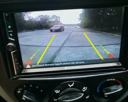 Черный Шевроле Лачетти, объемом двигателя 1.8 л и пробегом 265 тыс. км за 4600 $, фото 38 на Automoto.ua