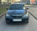 Черный Шевроле Лачетти, объемом двигателя 1.6 л и пробегом 305 тыс. км за 3200 $, фото 1 на Automoto.ua