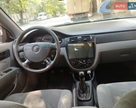 Черный Шевроле Лачетти, объемом двигателя 1.6 л и пробегом 400 тыс. км за 4000 $, фото 1 на Automoto.ua