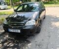 Черный Шевроле Лачетти, объемом двигателя 1.6 л и пробегом 193 тыс. км за 3500 $, фото 1 на Automoto.ua