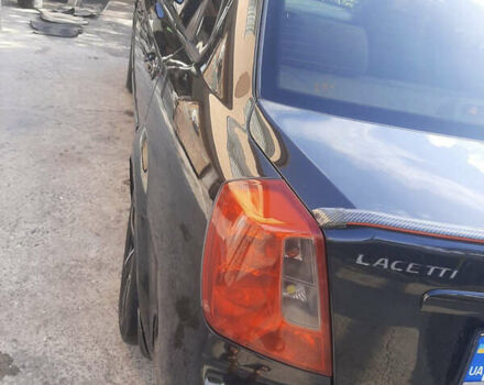 Черный Шевроле Лачетти, объемом двигателя 1.6 л и пробегом 215 тыс. км за 4000 $, фото 2 на Automoto.ua