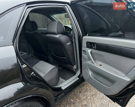 Черный Шевроле Лачетти, объемом двигателя 1.8 л и пробегом 243 тыс. км за 4489 $, фото 11 на Automoto.ua