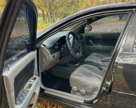 Черный Шевроле Лачетти, объемом двигателя 1.6 л и пробегом 240 тыс. км за 4300 $, фото 1 на Automoto.ua