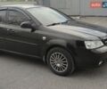 Черный Шевроле Лачетти, объемом двигателя 1.8 л и пробегом 229 тыс. км за 4499 $, фото 1 на Automoto.ua