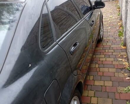 Черный Шевроле Лачетти, объемом двигателя 1.8 л и пробегом 282 тыс. км за 3500 $, фото 8 на Automoto.ua